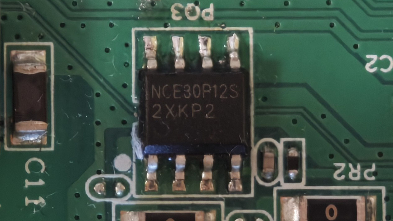 G-140W-MD 主板局部:丝印 NCE30P12S 的 SOP-8 封装 P 沟道 MOSFET,位于电源通路